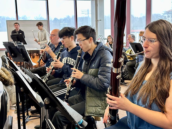 Academy Orchestra students and Andrew Lamy in rehearsal